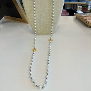 42” White Freshwater Pearl w/twin 24K Fleur Connectors